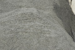 (\"Blue\" Stonedust)  Pulverized Granite makes a smart flagstone base.