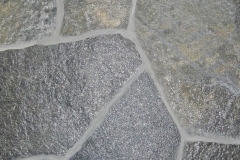 Greatly resembles Swiss Sparkle, although considerably smoother in texture. Hand-Split Thin Veneer ranges in thickness from 1" to 3" with a nominal face range of 6" to 18". Average coverage is approximately 100 to 110 square feet per ton. A brick ledge of 4" to 6" is recommended when laying this product as a facade. Packaged in 1-ton Pallets.